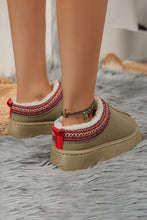 Lade das Bild in den Galerie-Viewer, Close-up view of feet wearing Contrast Print Suede Plush Lined Snow Boots with decorative red and white pattern and plush lining, standing on a soft gray rug.