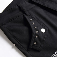 Load image into Gallery viewer, Men's Scotland Red Plaid Tartan Patchwork Jeans Punk Rivet Patch Black Denim Pants Skull Letters Printed Slim Straight Trousers