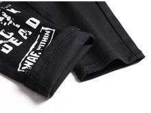 Lade das Bild in den Galerie-Viewer, Men's Scotland Red Plaid Tartan Patchwork Jeans Punk Rivet Patch Black Denim Pants Skull Letters Printed Slim Straight Trousers