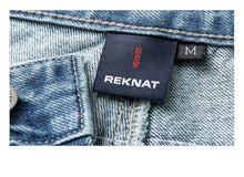 Load image into Gallery viewer, SHADOW FASHION CLOTHING blue denim jeans label with REKNAT branding and size M tag
