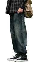 Load image into Gallery viewer, SHADOW FASHION CLOTHING men's loose denim harem pants with a vintage wash, styled for a casual streetwear look.
