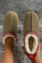 Lade das Bild in den Galerie-Viewer, Pair of beige Contrast Print Suede Plush Lined Snow Boots with red and black decorative trim, worn on feet and held in hand, showcasing warmth and cozy plush interior.
