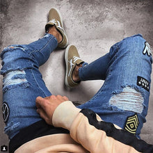 Load image into Gallery viewer, Men's Ripped jeans Badge Letters Hip-hop Skinny Jogging Denim  Fashion Pencil Long Trousers Distressed Jeans For Men Clothing
