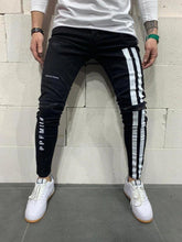 Load image into Gallery viewer, Men's Ripped jeans Badge Letters Hip-hop Skinny Jogging Denim  Fashion Pencil Long Trousers Distressed Jeans For Men Clothing
