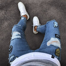 Load image into Gallery viewer, Men's Ripped jeans Badge Letters Hip-hop Skinny Jogging Denim  Fashion Pencil Long Trousers Distressed Jeans For Men Clothing
