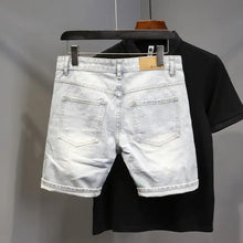 Load image into Gallery viewer, Summer Old Light White Cat Whisker Ripped Denim Four-and-five Pants Men's Slim-fitting Small Feet Versatile Trend Short Pants
