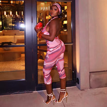 Load image into Gallery viewer, Two piece set of tight fitting seven part jumpsuit with deep V-neck print and headband
