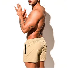 Load image into Gallery viewer, Summer New Men's Solid Color Sports Shorts Casual Fashion Trend Loose Simple Breathable Quick-Drying Gym Beach Men's Bottoms
