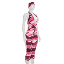 Load image into Gallery viewer, Two piece set of tight fitting seven part jumpsuit with deep V-neck print and headband
