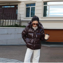 Load image into Gallery viewer, Fashion Shiny Solid Hooded Quilted Jacket Women Stand Collar Long Sleeve Zipper Pocket Street Warm Coat 2026 Winter Lady Outwear
