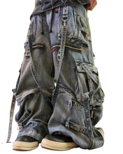 Load image into Gallery viewer, SHADOW FASHION CLOTHING baggy distressed denim cargo jeans with metal zippers, straps, and pockets in a Y2K style.
