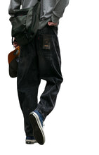 Load image into Gallery viewer, SHADOW FASHION CLOTHING loose fit black denim harem pants for men with back pockets and streetwear style
