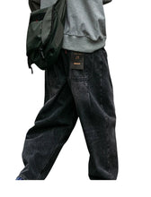 Load image into Gallery viewer, SHADOW FASHION CLOTHING men's loose-fit black denim harem pants with a casual streetwear style and button fly closure.
