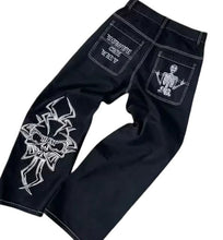 Load image into Gallery viewer, SHADOW FASHION CLOTHING black baggy cotton jeans with white gothic skeleton print and Y2K streetwear design
