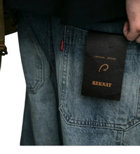 Load image into Gallery viewer, SHADOW FASHION CLOTHING blue denim cargo pants with a branded tag on the back pocket, featuring a loose streetwear fit.
