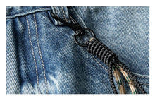 Load image into Gallery viewer, SHADOW FASHION CLOTHING blue denim jeans featuring a black metal clip and patterned drawstring detail
