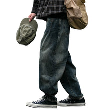 Load image into Gallery viewer, SHADOW FASHION CLOTHING men's loose fit denim harem pants in a distressed vintage blue wash for a casual streetwear look
