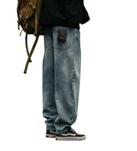 Load image into Gallery viewer, SHADOW FASHION CLOTHING men's loose-fit blue denim cargo jeans with a casual streetwear style and harem pant silhouette

