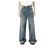 Load image into Gallery viewer, SHADOW FASHION CLOTHING men's loose-fit wide-leg denim jeans in light wash blue with distressed worn-out details.
