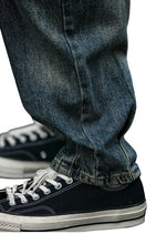 Load image into Gallery viewer, SHADOW FASHION CLOTHING vintage blue denim harem pants with a loose fit worn with black canvas sneakers
