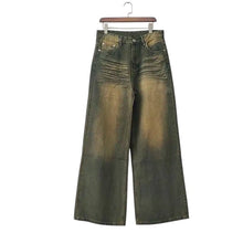 Load image into Gallery viewer, SHADOW FASHION CLOTHING men's loose wide-leg denim jeans in a faded worn-out green and brown wash with zipper fly.

